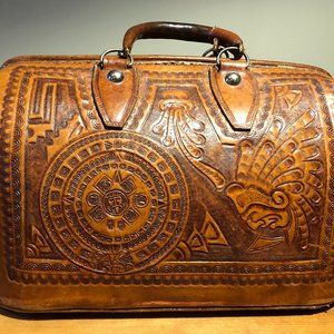 Vintage leather, ornately hand-tooled Mexican doctor's bag.